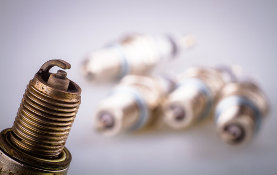  old automotive spark on blurred background