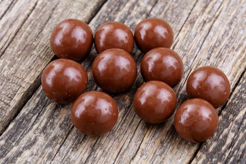 Chocolate candies on a white background.