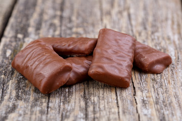 Chocolate candies on a white background.