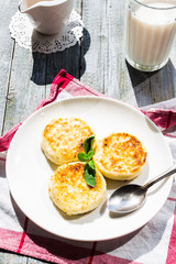 cottage cheese pancakes with mint and powdered sugar