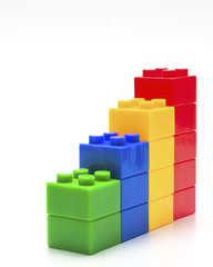Colorful stacked toy building blocks. - 83664702