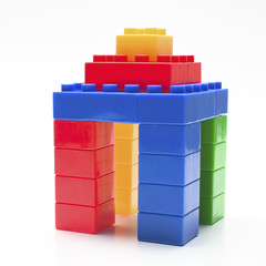 Shape of house made from plastic building blocks. - 83664709