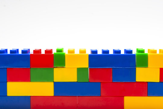 Wall made from plastic building blocks.