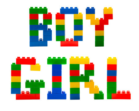 Boy and girl word build from toy building blocks
