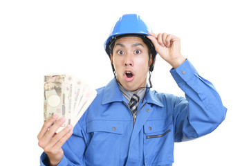 驚いた表情の労働者