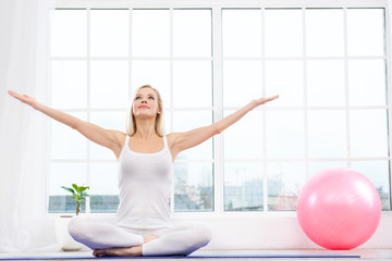 Fototapeta premium Yoga concept with young woman