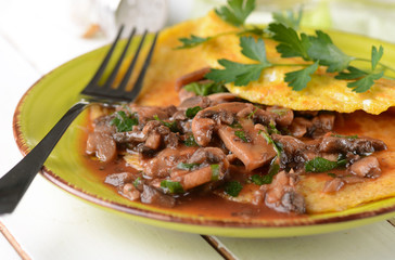 Omelette ai funghi con prezzemolo