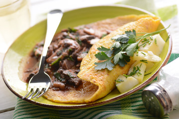 Omelette ai funghi con prezzemolo