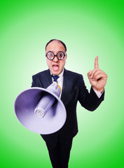 Funny man with loudspeaker on white
