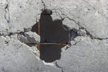 Hole in concrete pipe