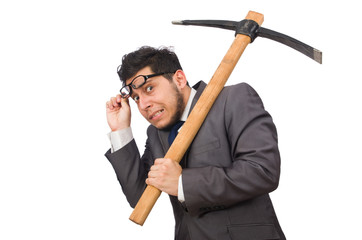 Young businessman holding a tool isolated on white