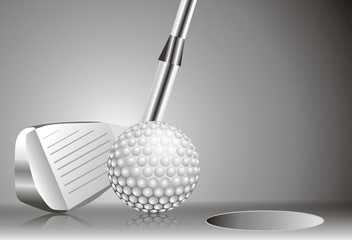 putting with golf club and ball 