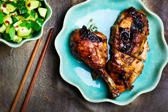 the chicken baked in Asian style and cucumber salad