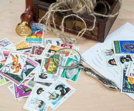 old magnifier, stamp, postage stamps
