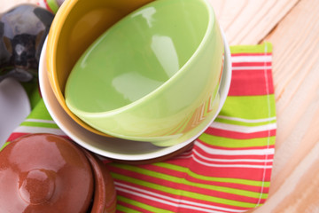 plates and cups on wooden table