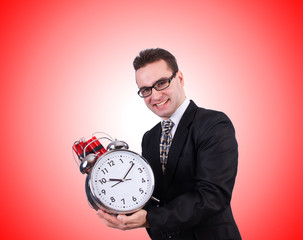 Man with time bomb isolated on white