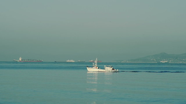 Fishing boat out to fish at dawn