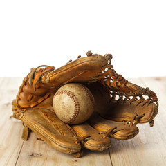 Old baseball glove with baseball
