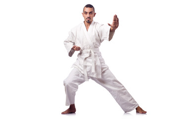 Karate fighter isolated on the white