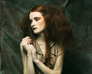 fashion model sitting on a stool