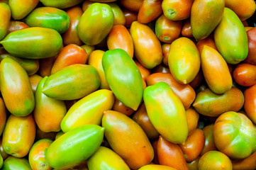 Fresh raw red and green tomatoes