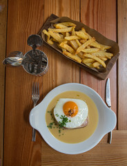 tuna steak with chips, egg, and special sauce