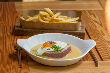 tuna steak with chips, egg, and special sauce