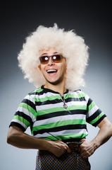 Funny man with afro hairstyle isolated on white