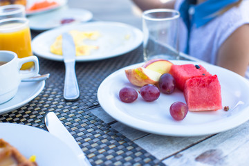 Healthy breakfast on the table closeup in outdoor cafe