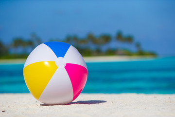 Air ball at white beach with turquoise sea and blue sky