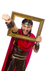 Gladiator holding picture frame isolated on white