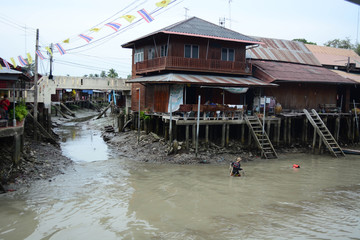 house and canal in Thailand