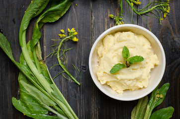 Mashed potato on wooden background