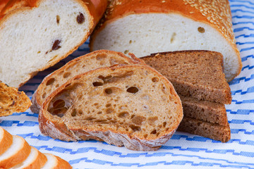 Sliced bread on a blue tablecloth