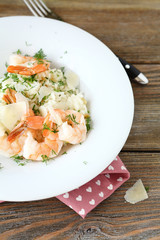 Italian Rice with shrimp and dill on a plate