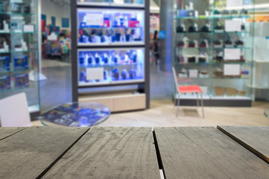 Defocus and blur image of terrace wood and camera shop for backg