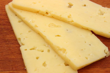 Cutting of cheese