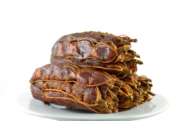 Ripe tamarind on white background