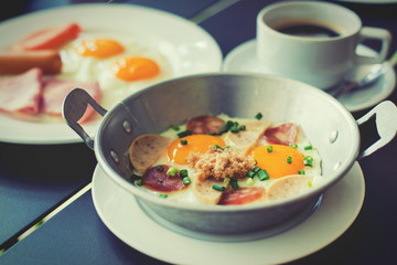 egg dish Breakfast served with fried egg, ham, orange juice, del