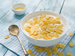 Cornflakes cereal and milk.