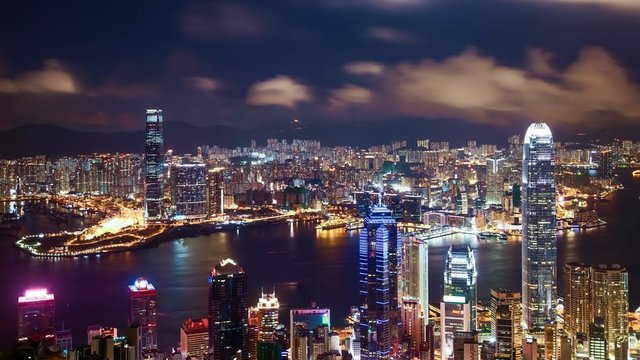 Timelapse of Hong Kong skyline at night, China (4K, UHD)