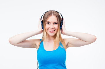 Happy woman with headphones listening music