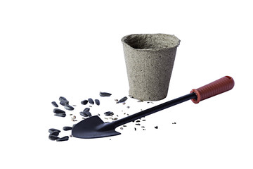 Seeds, pot and spade for planting