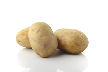 Three Potatoes on White Background