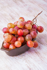 Pink grapes in bowl