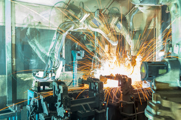  welding robots  the movement. In the automotive parts industry.