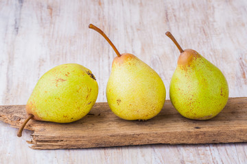 Pears on a old board.