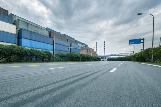 Empty road near container dock