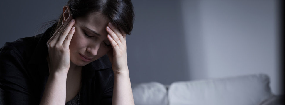 Despair crying widow woman