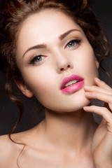 Fototapeta premium Close-up portrait of beautiful woman with bright make-up